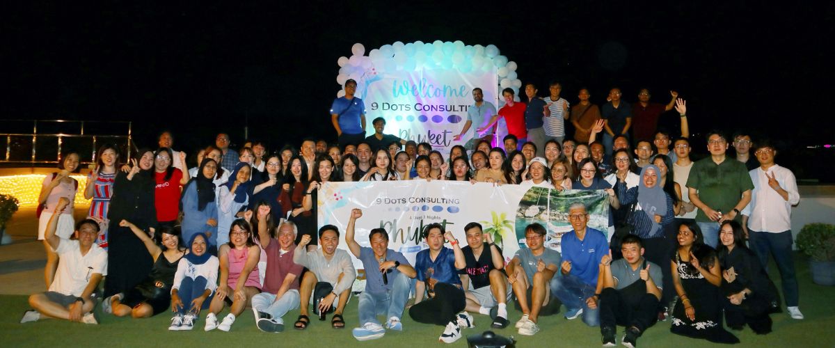 9 Dots Consulting team group photo during the 2025 company trip in Phuket, Thailand