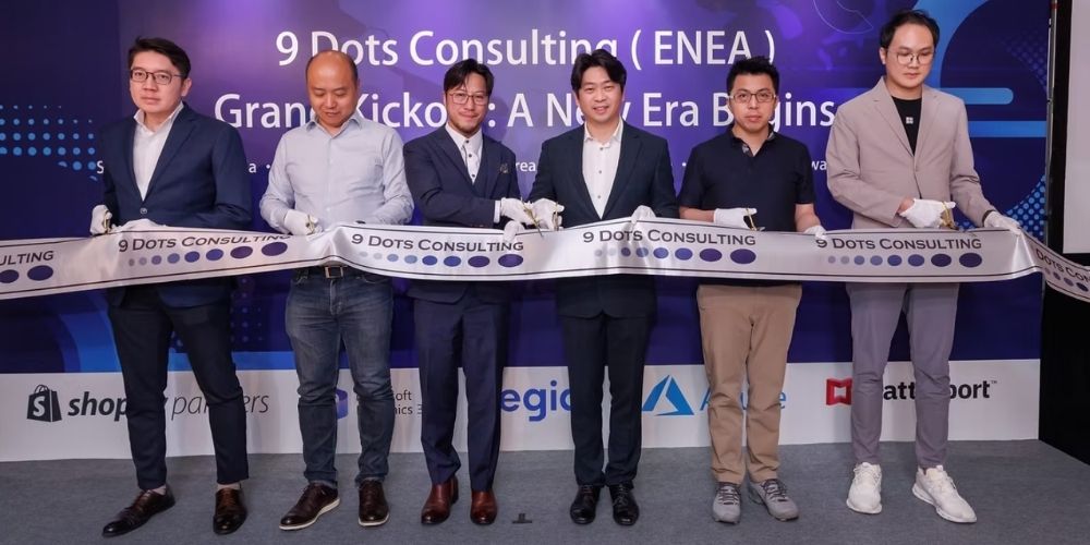 9 Dots Consulting team group photo marking expansion Across ENEA